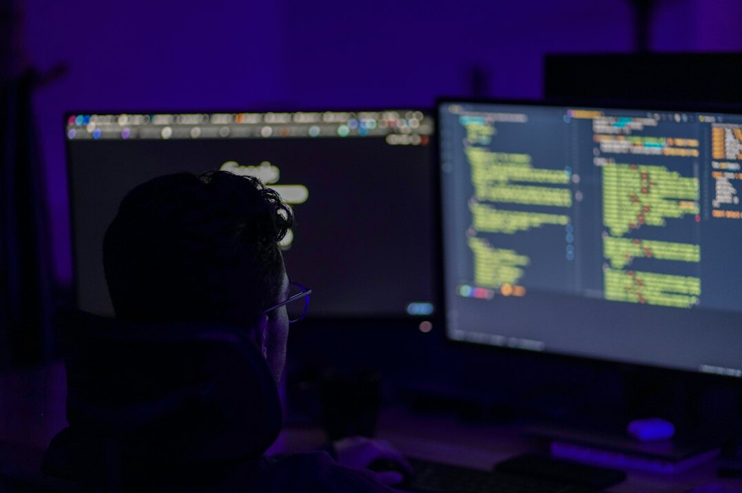 person learning programming on computer