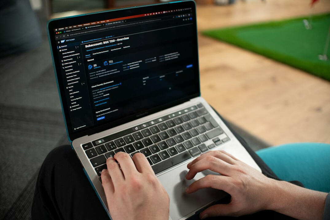 programmer learning code on laptop